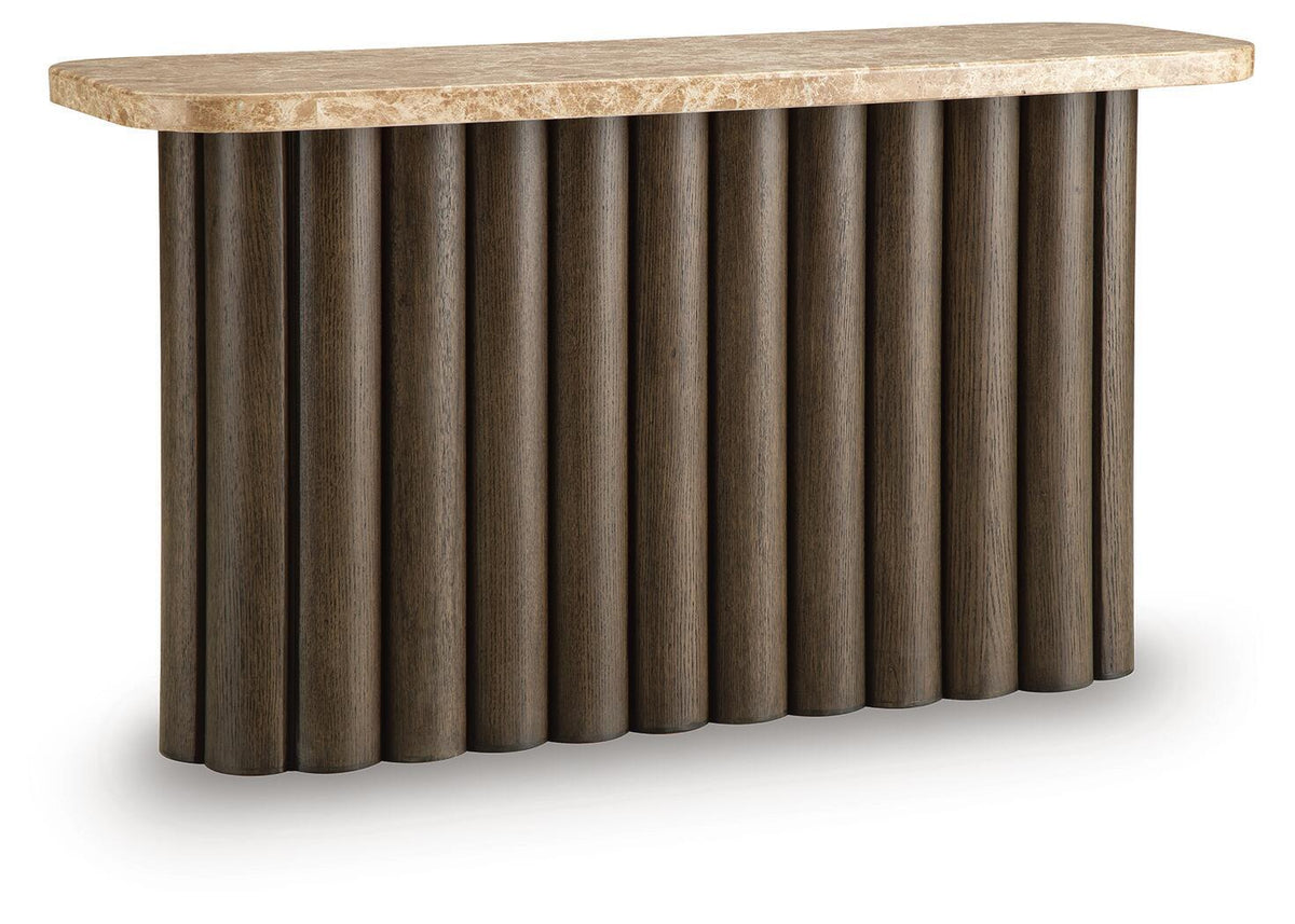 Rectangular table with speckled light stone top and dark fluted pedestal sides