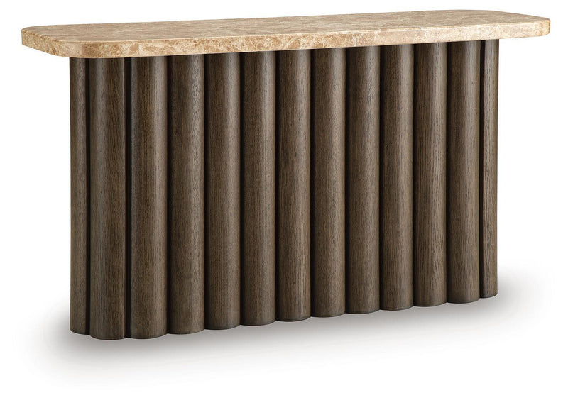 Rectangular table with speckled light stone top and dark fluted pedestal sides