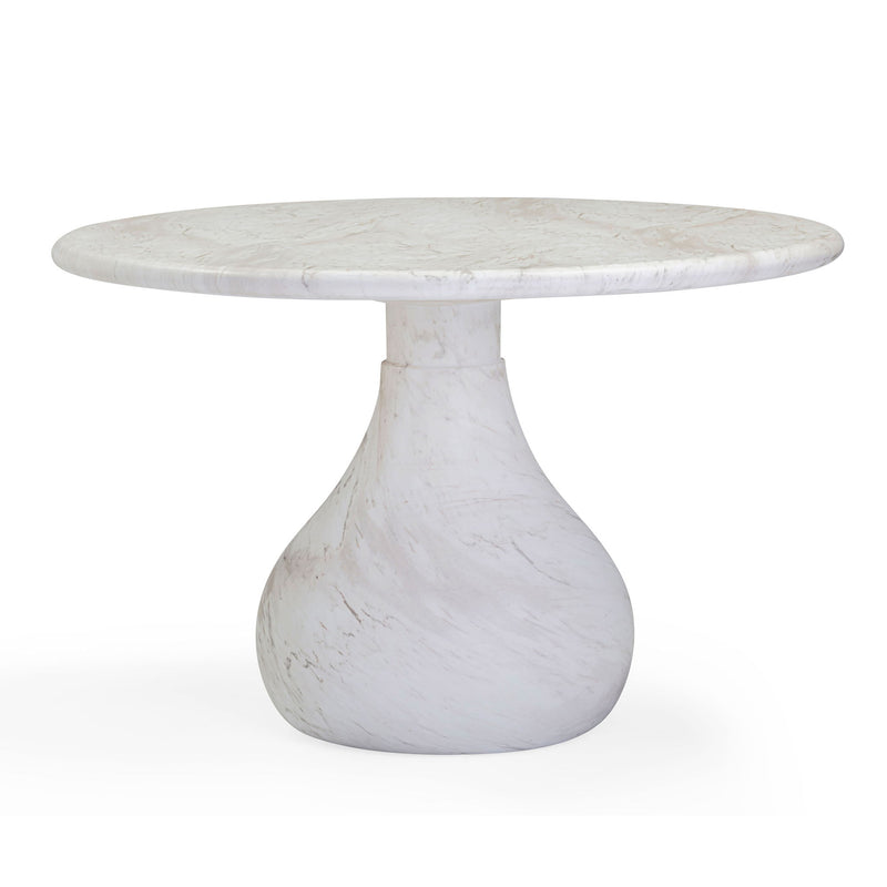 Pearl silver round dining table with white marble-look top and pedestal base, side view