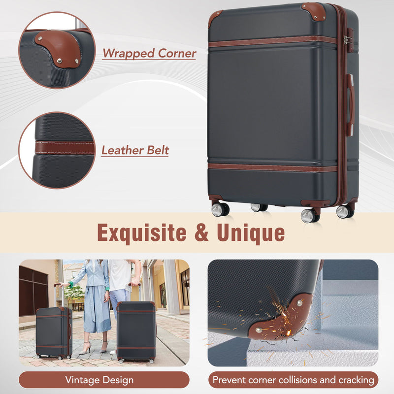 Dark hardshell spinner suitcase with wrapped corner protection and leather-belt trim.