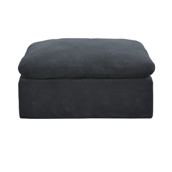 Dark gray upholstered ottoman with padded cushioned top and clean stitched edges