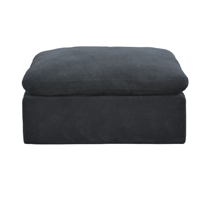 Dark gray upholstered ottoman with padded cushioned top and clean stitched edges