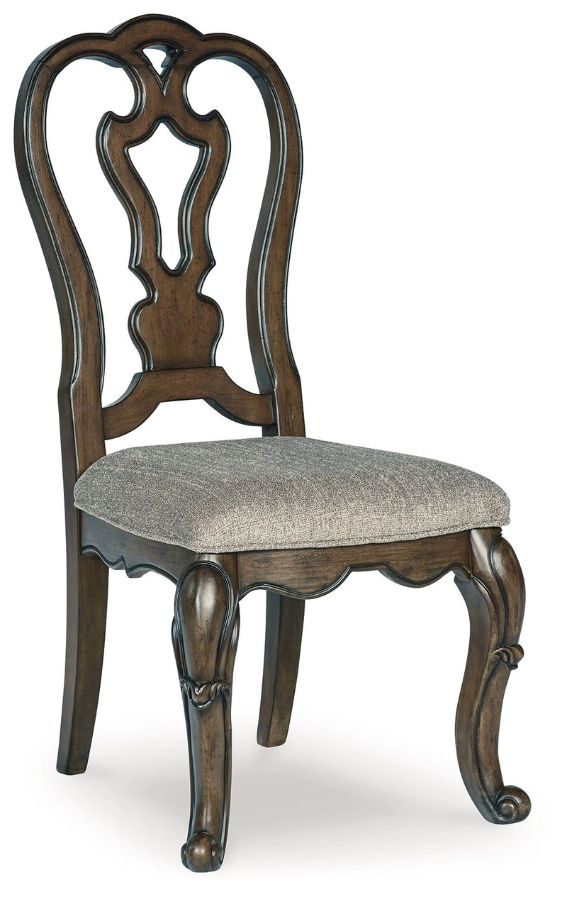 Maylee dining side chair with dark brown carved back and gray upholstered seat