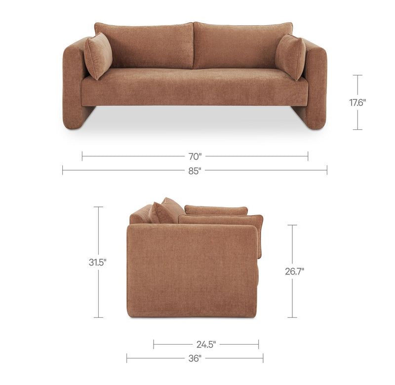 Dusty pink fabric sofa front view with rounded arms and two bolster cushions