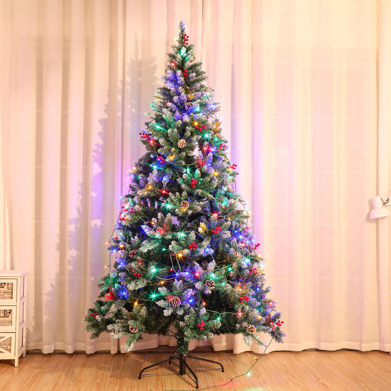 Artificial Christmas tree with multicolor LED lights, red ornaments, and snowy branches