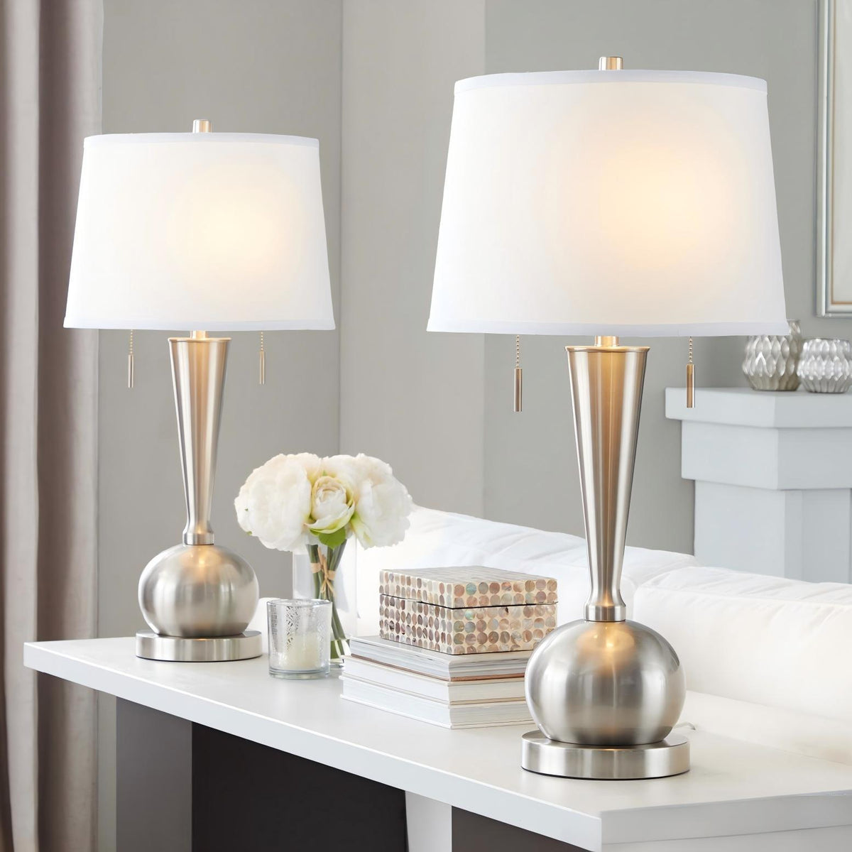 Set of 2 nickel table lamps with white shades, tapered stems and round bases