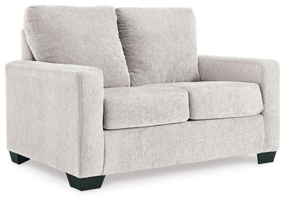 Light beige fabric loveseat sofa with three seat cushions and tall backrests