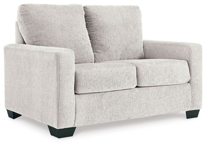 Light beige fabric loveseat sofa with three seat cushions and tall backrests