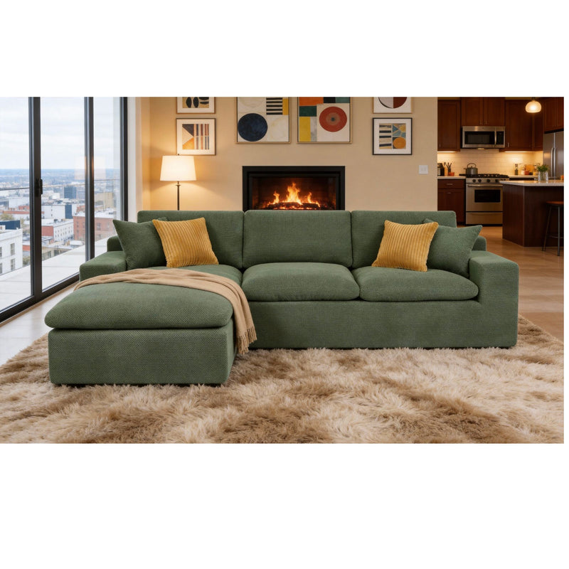 Dark green U-shaped sectional sofa with chaise and two yellow accent pillows