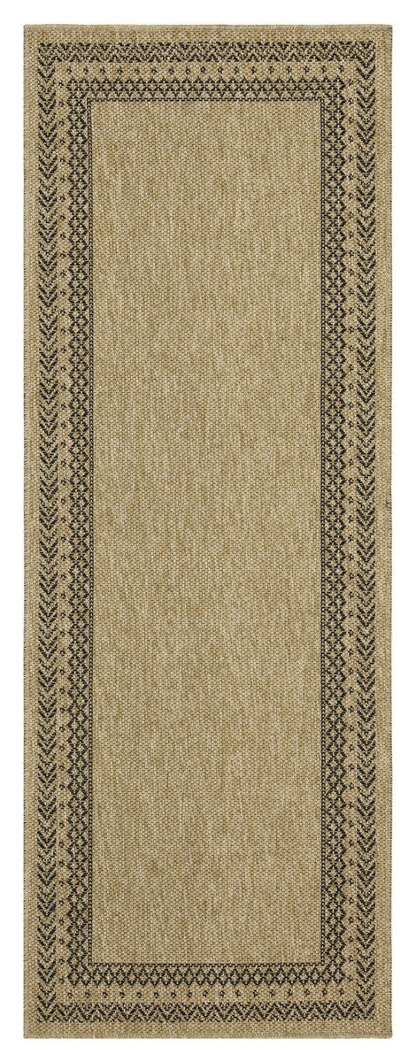 Light brown area rug with dark geometric border and centered rectangular panel.