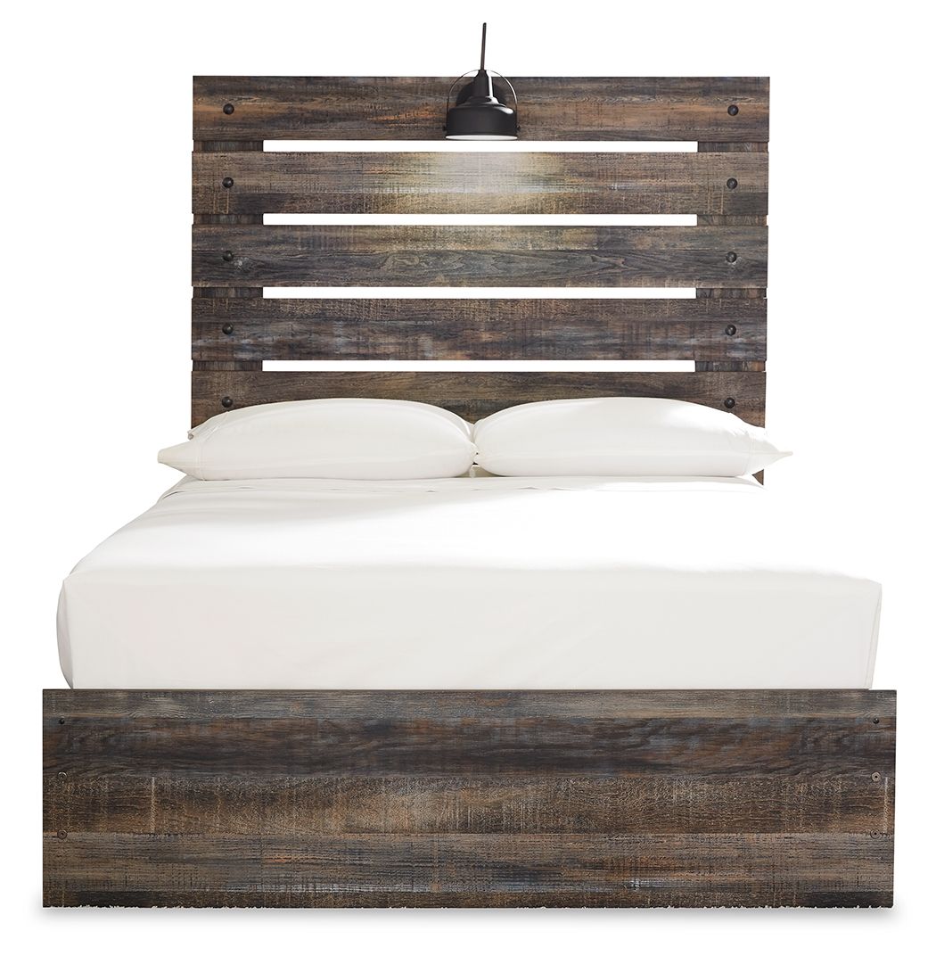 Panel bed with dark wood headboard slats and a solid platform base
