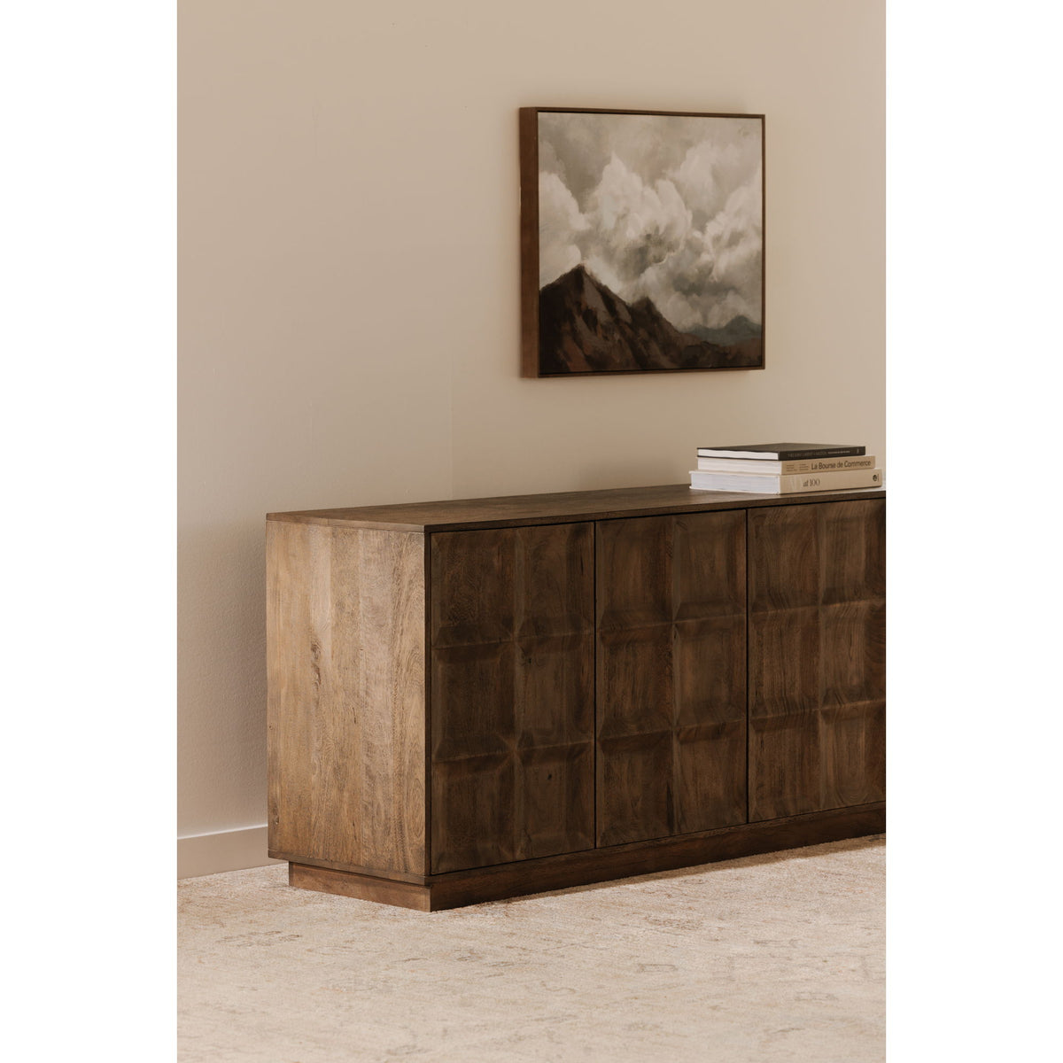 Deep brown sideboard with square paneled doors, squared legs, and flat top
