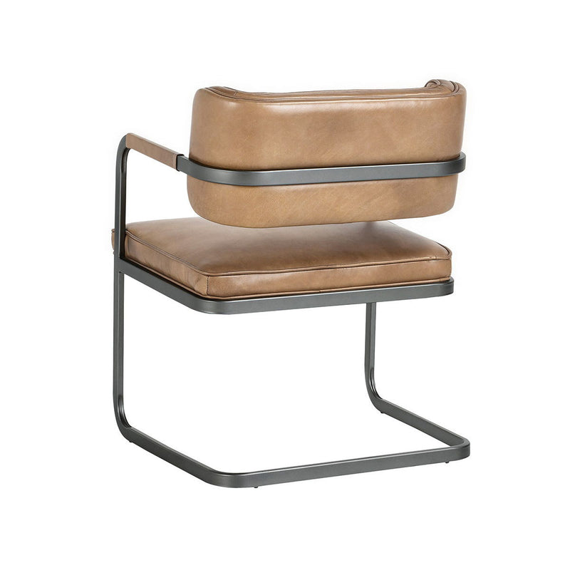 Tan dining chair with padded seat and back, and dark metal cantilever frame
