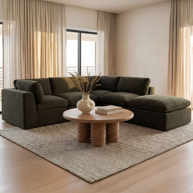 Dark green modular sectional sofa with chaise corner seating and wide cushions