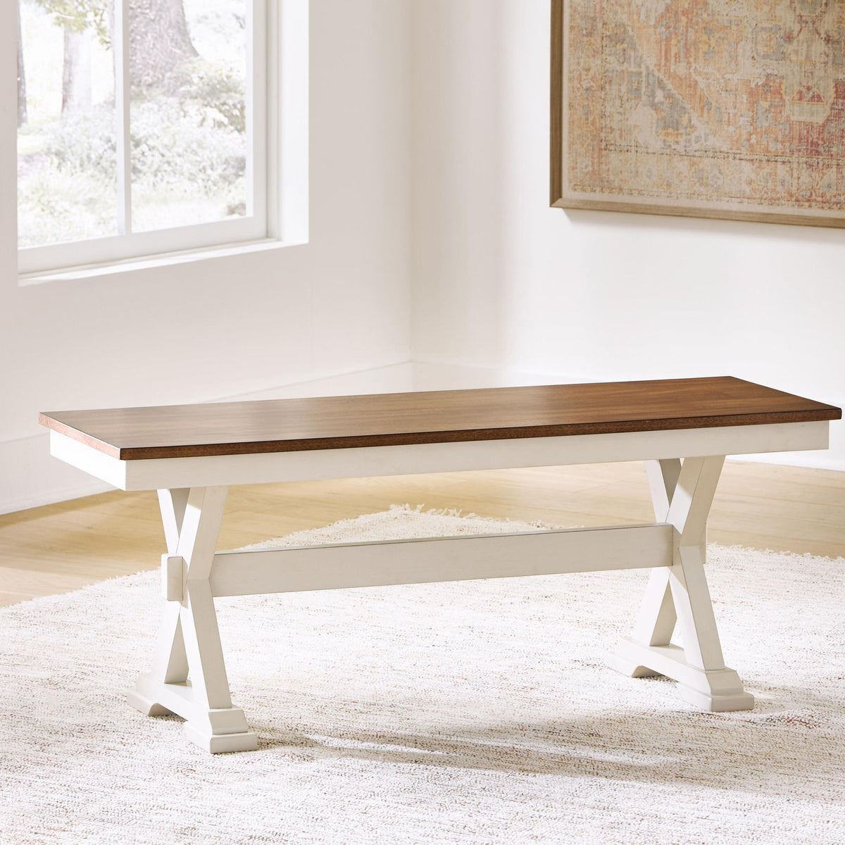 Dark brown wood dining bench with white trestle legs and underside shelf