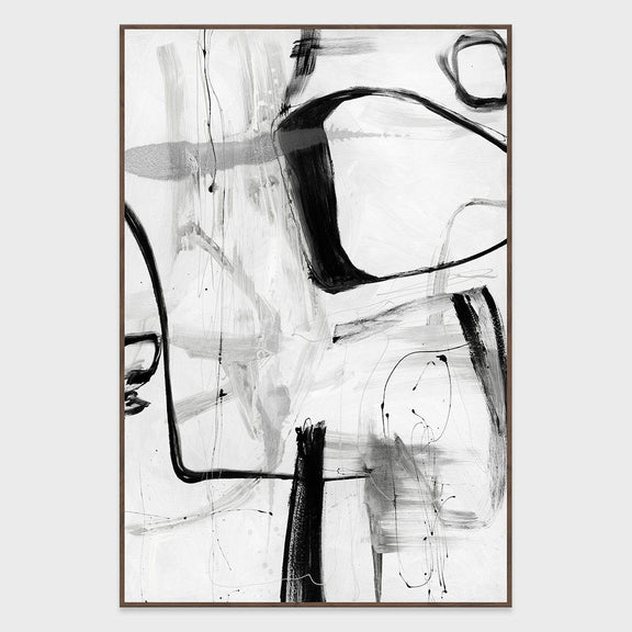Framed abstract wall art with bold black lines and scattered gray marks