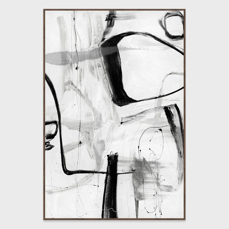 Framed abstract wall art with bold black lines and scattered gray marks
