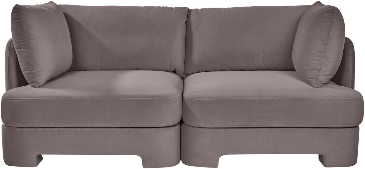 Slate gray velvet upholstered loveseat with rounded arms and two seat sections