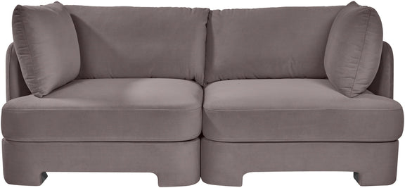 Slate gray velvet upholstered loveseat with rounded arms and two seat sections