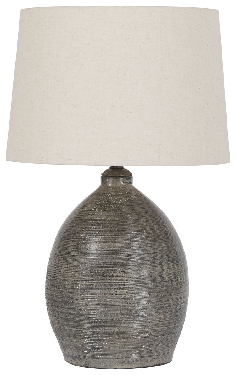 Gray ceramic table lamp with beige fabric drum shade and finial
