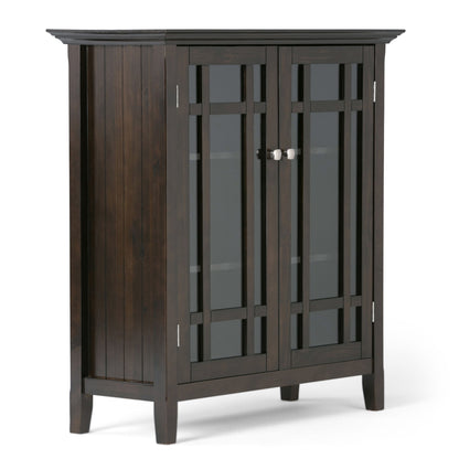 Dark brown storage media cabinet with two glass doors and vertical grid panels