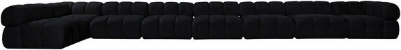 Black velvet L-shaped sectional sofa, top side view of cushion segments