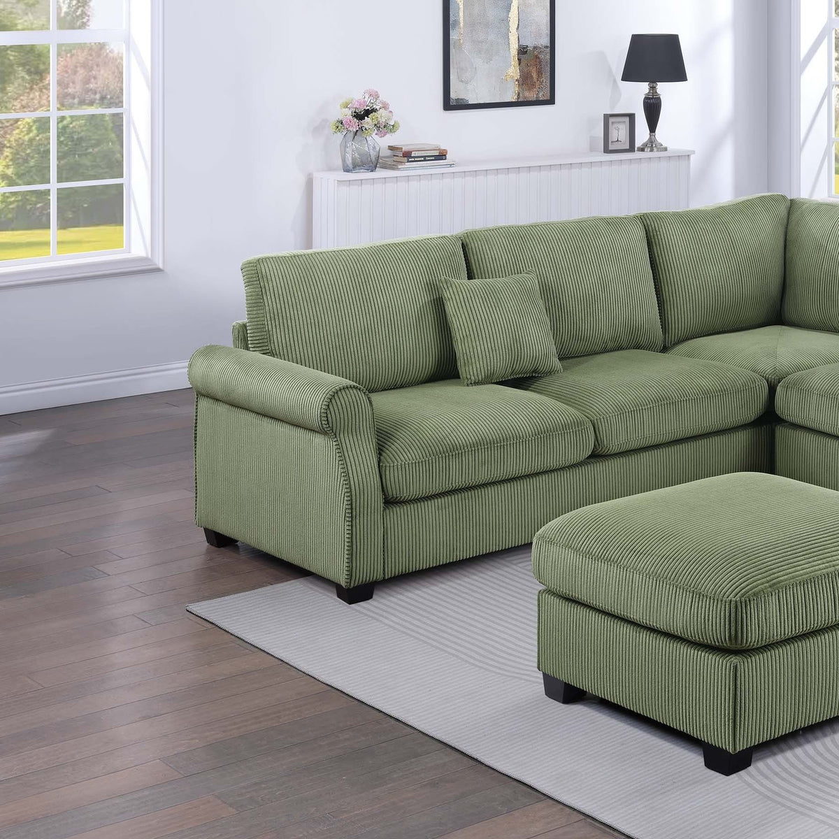 Sage green sectional sofa with coordinating ottoman, ribbed upholstery fabric