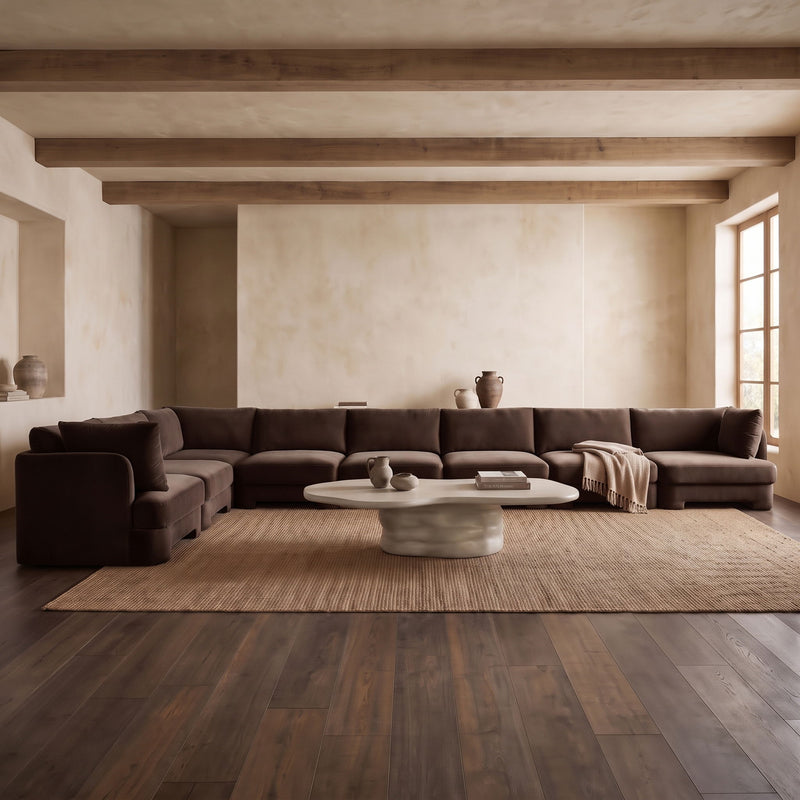 Dark brown L-shaped velvet sectional sofa with chaise lounge and low profile base
