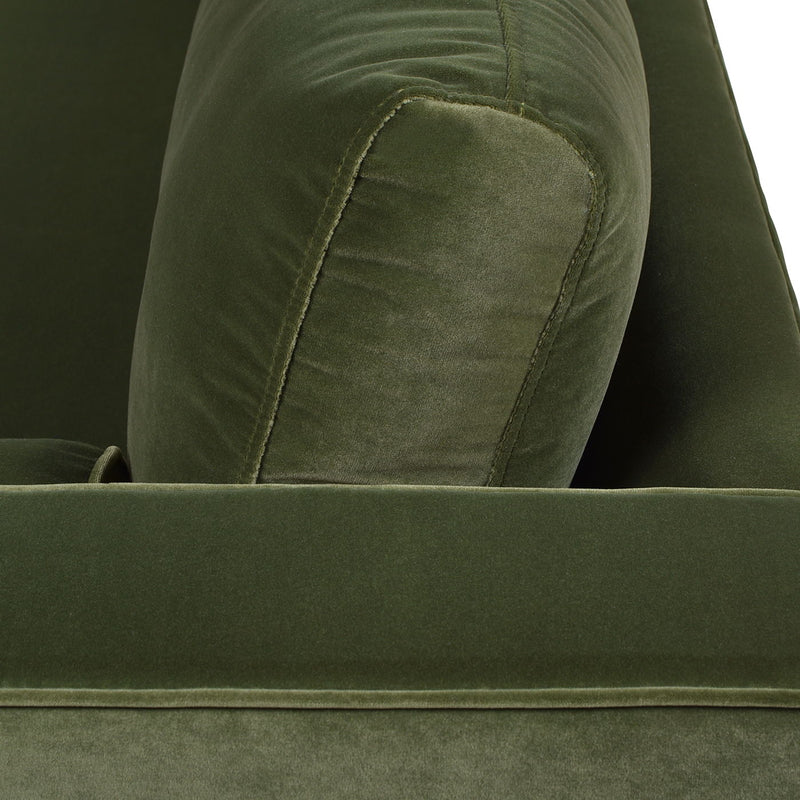 Olive green upholstered sofa arm and back cushion with stitched seam detail