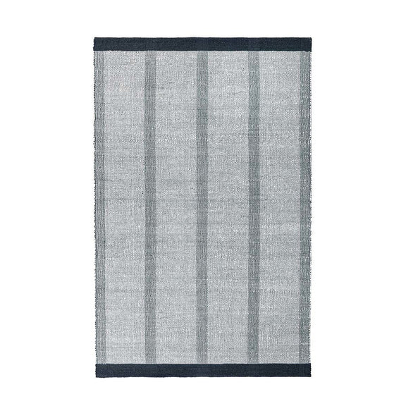 Ivory and gray striped rug with vertical muted green stripe accents and navy border.