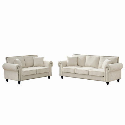 Beige tufted sofa set with rolled arms, two- and three-seat cushions