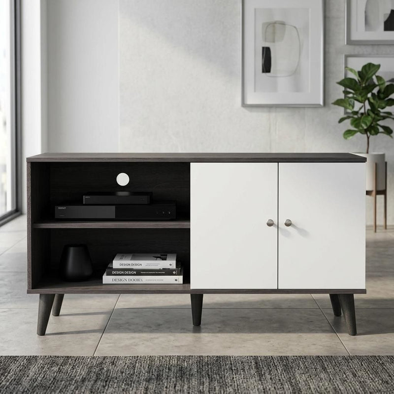 Dark wood TV stand with two open shelves and white cabinet doors, tapered legs