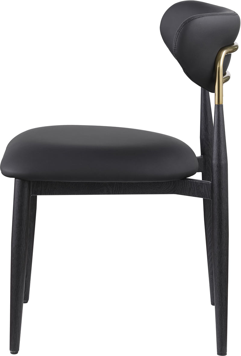 Upholstered dining side chair with black seat and rounded back, black legs