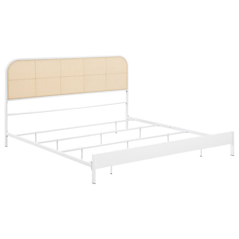 White metal bed frame with tan woven headboard, side view with slatted base.