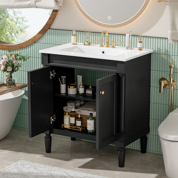 Black bathroom vanity cabinet with sink, open storage cabinet with shelves and bottles