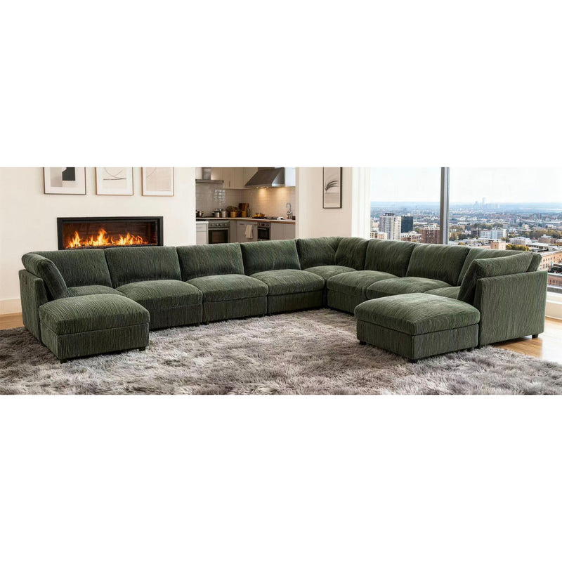 Dark green modular sectional sofa with ottoman chaise and extended seating