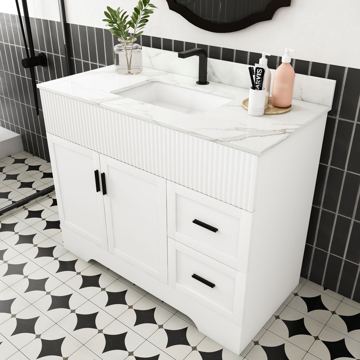White bathroom vanity with fluted panels, integrated rectangular sink, two doors and two drawers.
