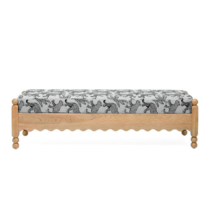 White leopard jacquard upholstered bench with scalloped skirt and wooden legs