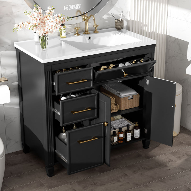 Black bathroom vanity with sink; open drawers and adjustable shelf space, gold hardware