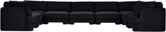 Black velvet performance fabric sectional sofa with multiple seats and curved chaise arm