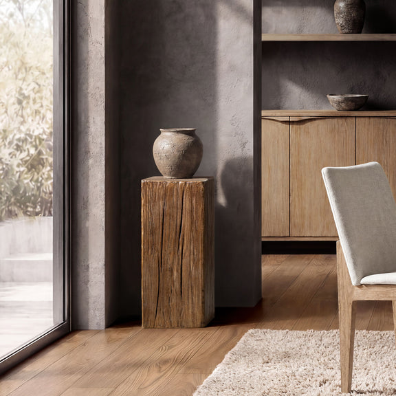 Tall dark brown wood side table with a square top and textured grain