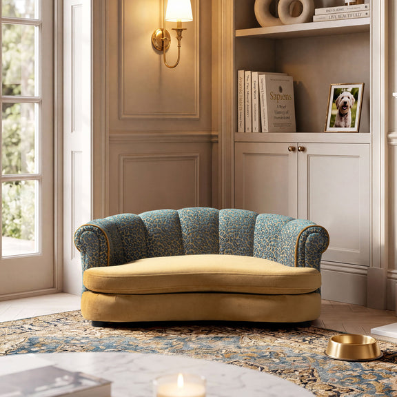 Blue patterned rolled-arm dog sofa bed with tan seat cushion