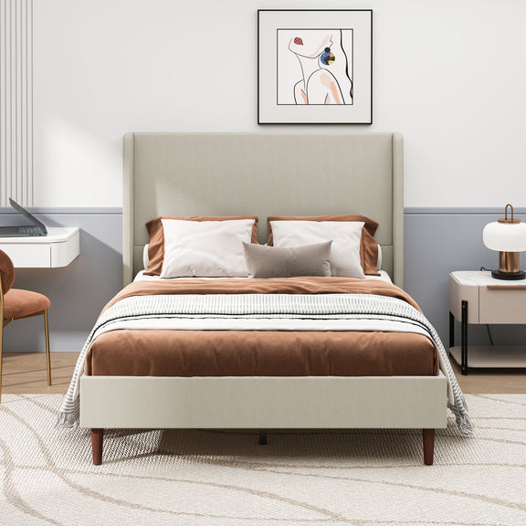 Beige upholstered bed with tall panel headboard and wood legs, viewed from the front