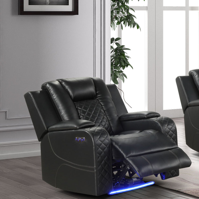 Black power recliner chair with adjustable headrest, reclined footrest, and LED lighting along base.