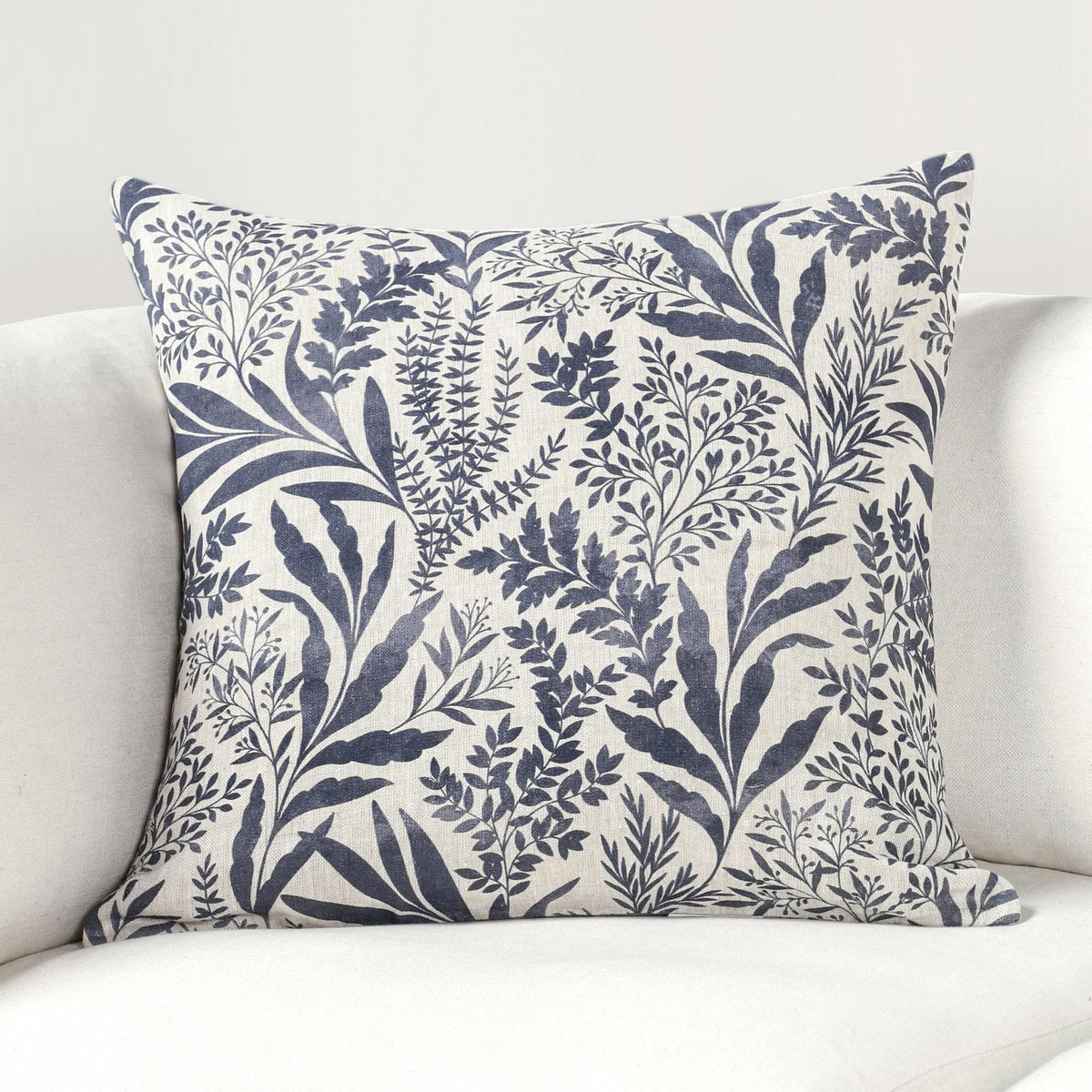 Rectangular pillow with denim blue and white botanical leaf print