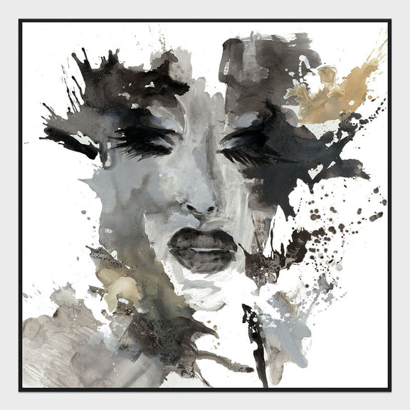 Framed abstract portrait painting in gray tones with gold-tan paint splashes and black accents