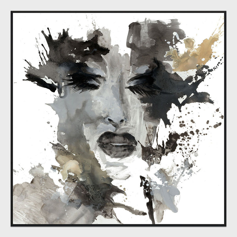 Framed abstract portrait painting in gray tones with gold-tan paint splashes and black accents