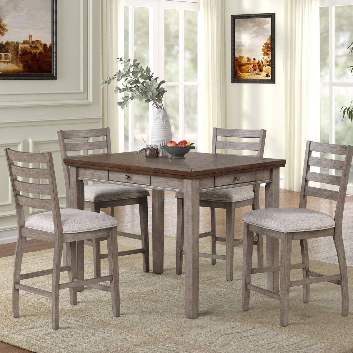 Gray ladder-back dining stools with upholstered seats around a wooden table
