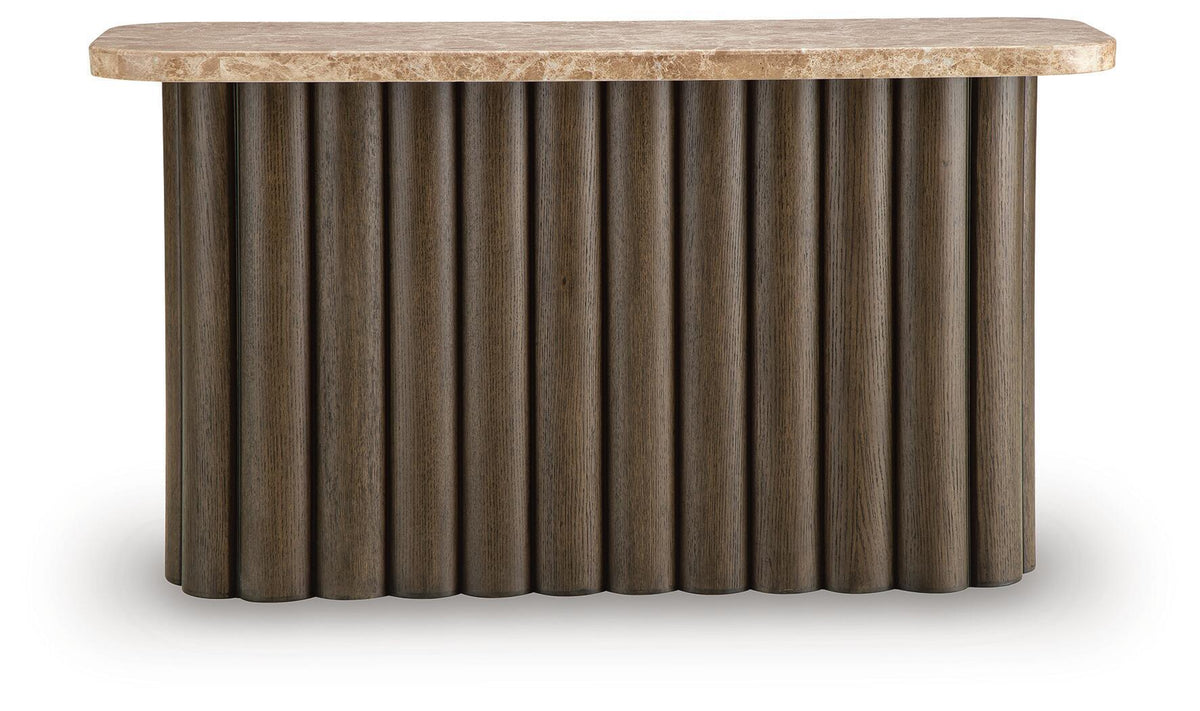 Rectangular table with speckled light stone top and dark ribbed curved base