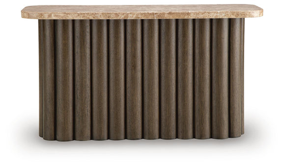 Rectangular table with speckled light stone top and dark ribbed curved base